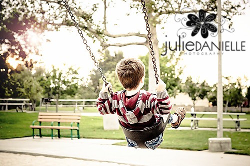 Little Boy Swinging